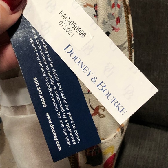 Dooney and Bourke Disney Santa’s Tails Backpack - Picture 14 of 15